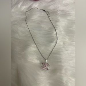 Authentic stamped Pendant and unbranded silver chain